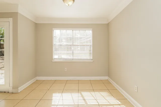 a view of a room with a window