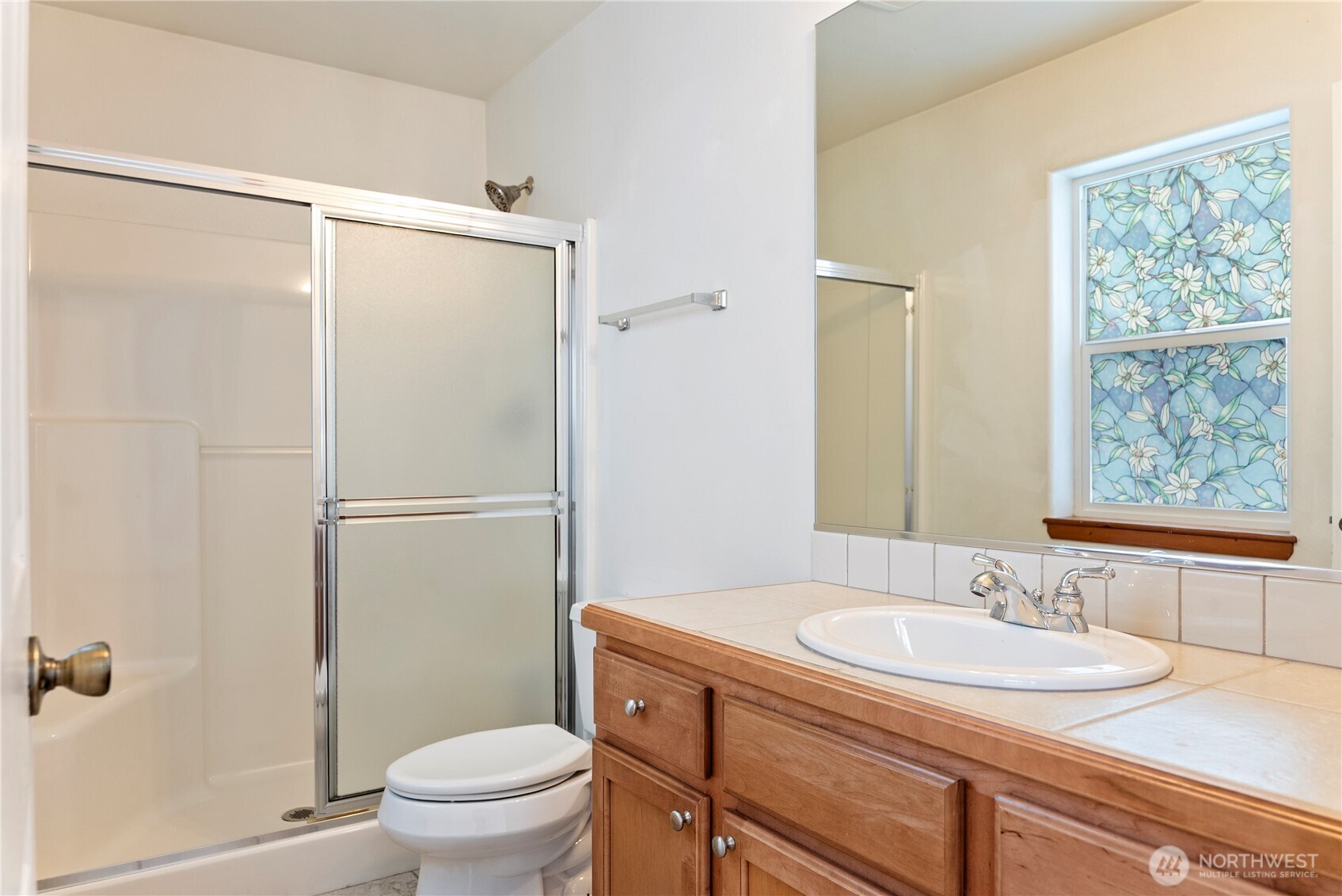 203 Washington Street Winthrop, WA 98862 - Photo 17 of 39 a bathroom with a sink toilet and shower