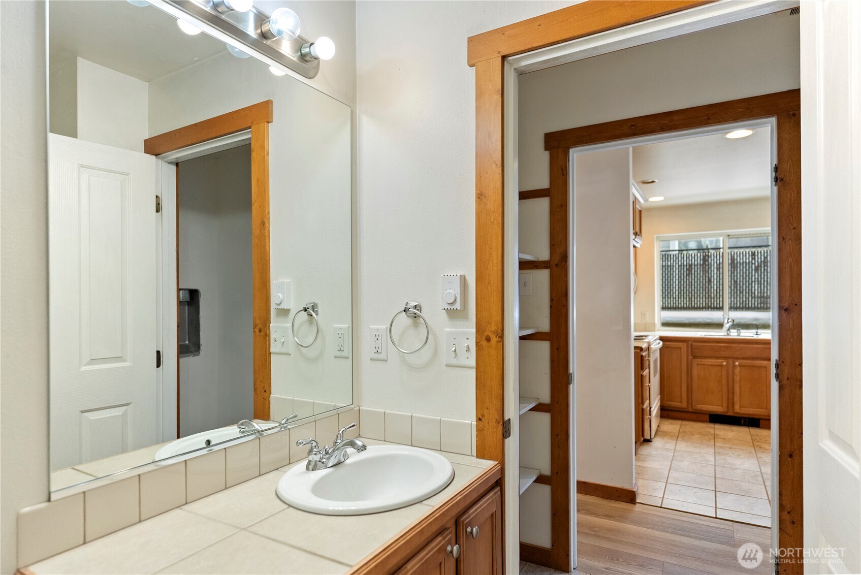 203 Washington Street Winthrop, WA 98862 - Photo 21 of 39 a bathroom with a sink and a mirror