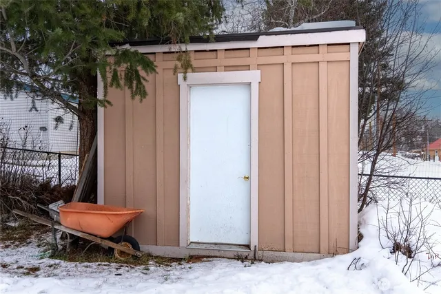 a view of a backyard of a house