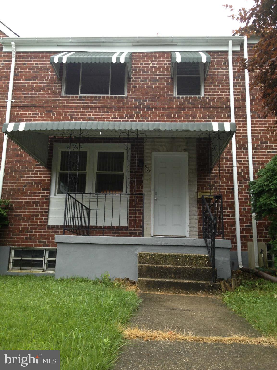 907 Masefield Road Baltimore, MD 21207 - Photo 1 of 23 a view of a house with a yard