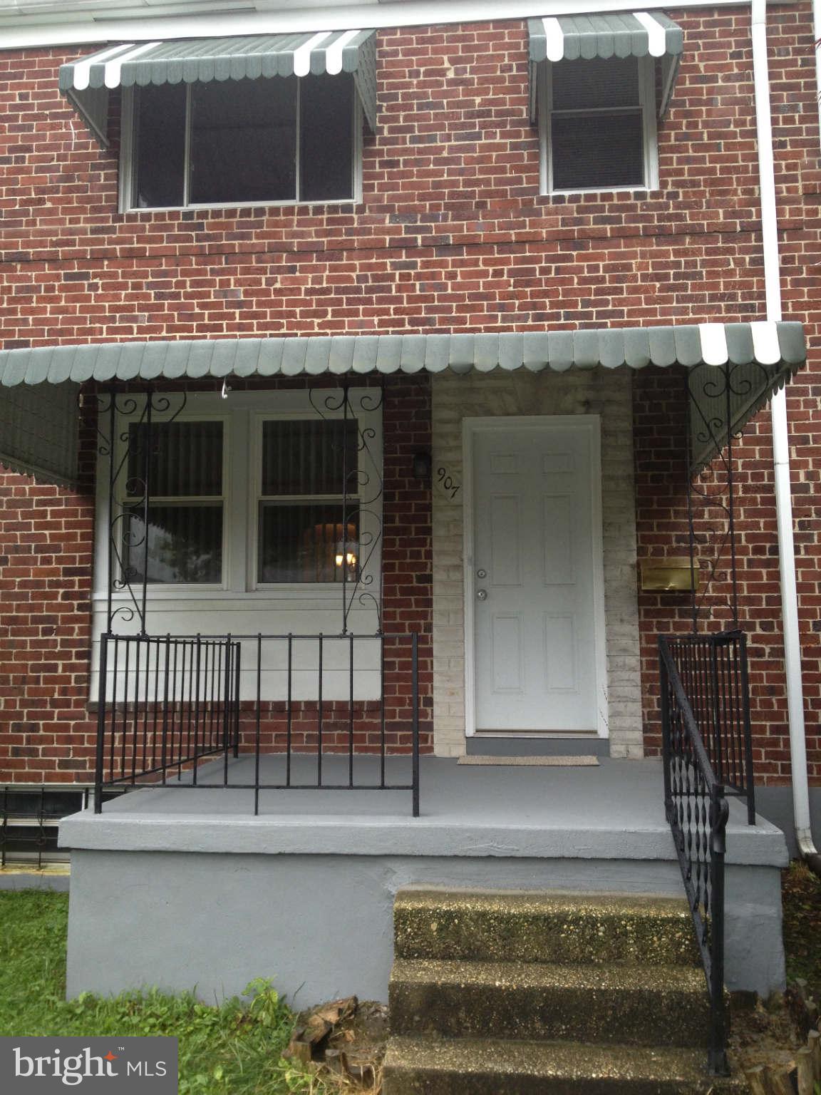 907 Masefield Road Baltimore, MD 21207 - Photo 18 of 23 a view of front door of house with stairs