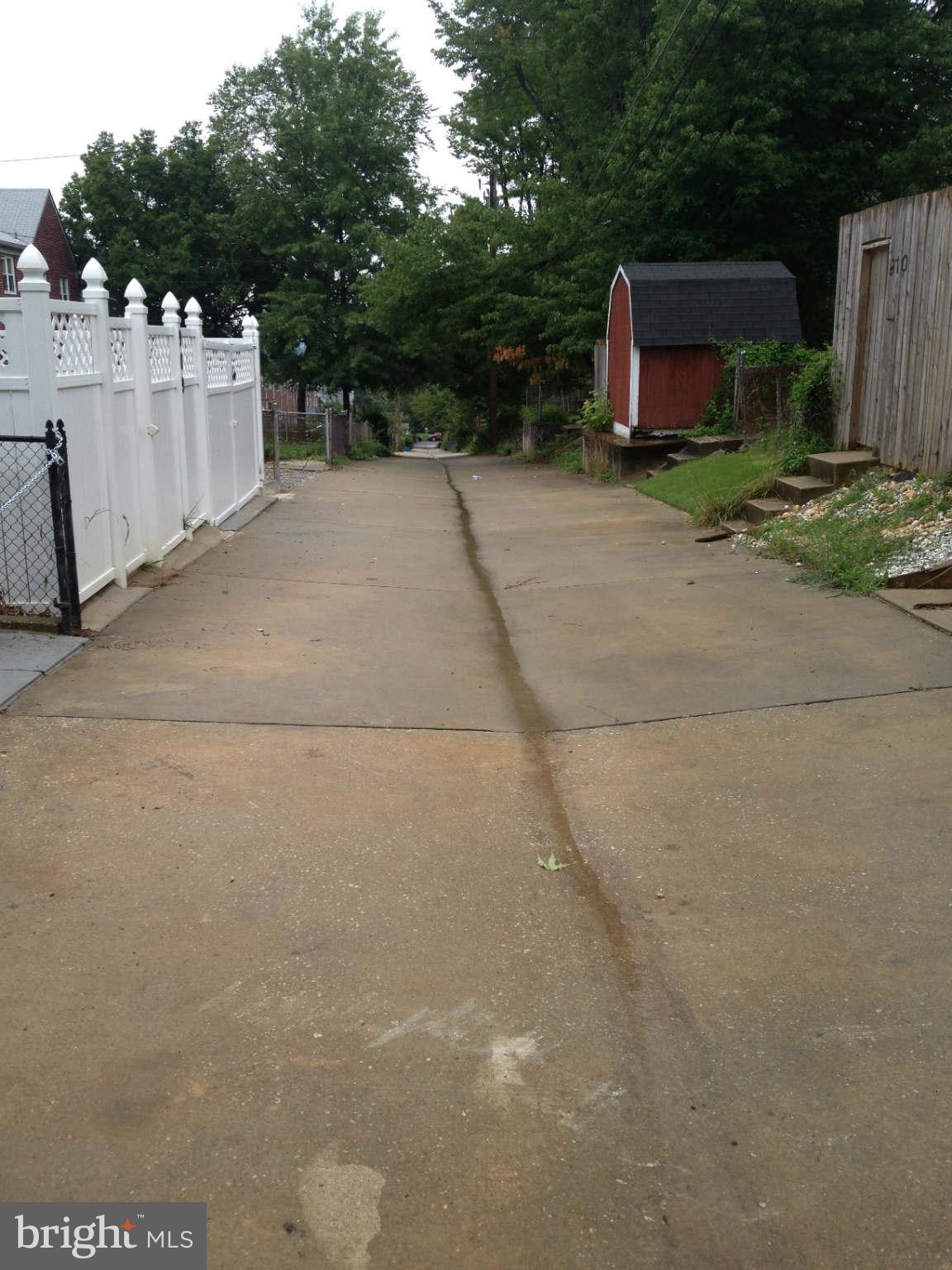 907 Masefield Road Baltimore, MD 21207 - Photo 21 of 23 a backyard of a house with seating space