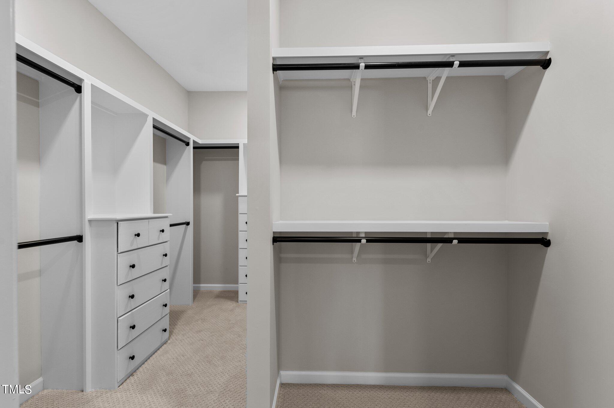 2009 Delphi Way Wake Forest, NC 27587 - Photo 26 of 40 a view of walk in closet with empty racks