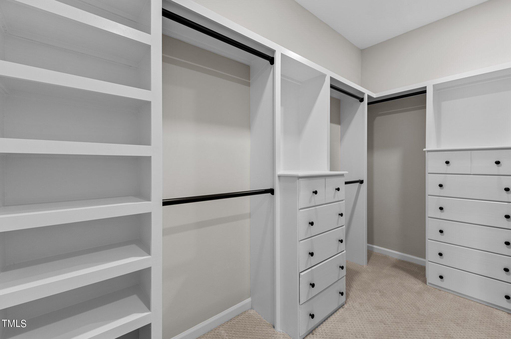 2009 Delphi Way Wake Forest, NC 27587 - Photo 27 of 40 a view of walk in closet with empty racks