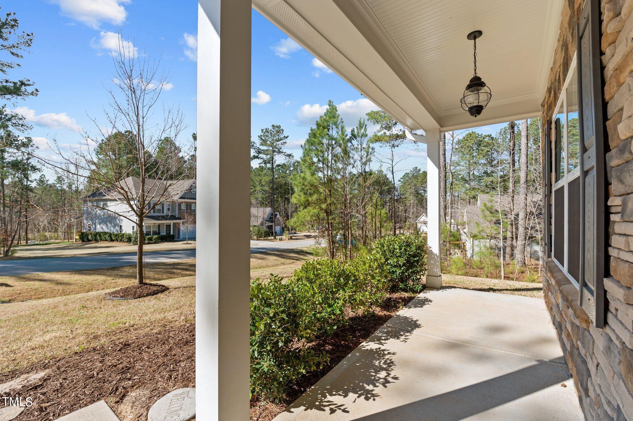 2009 Delphi Way Wake Forest, NC 27587 - Photo 3 of 40 a front view of a house with garden