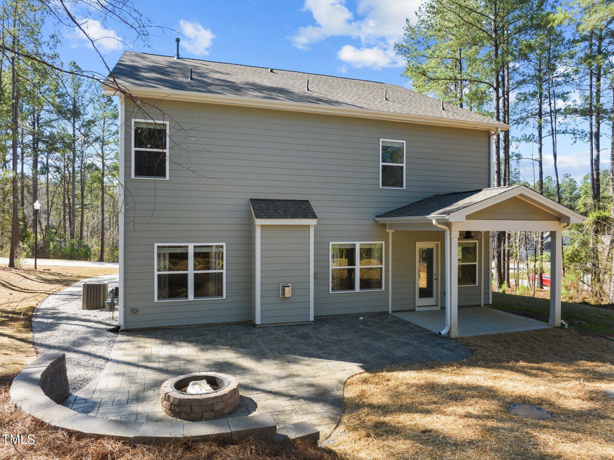 2009 Delphi Way Wake Forest, NC 27587 - Photo 35 of 40 a view of a house with a yard
