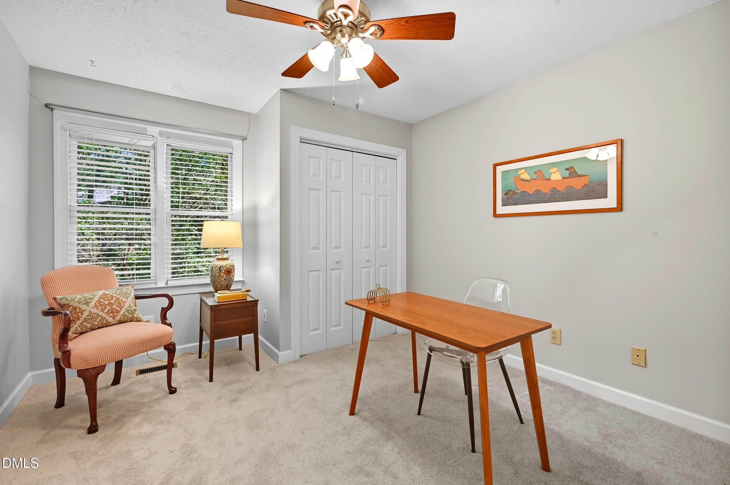 4111 Settlement Drive Durham, NC 27713 - Photo 20 of 25 a view of a workspace with furniture and a window
