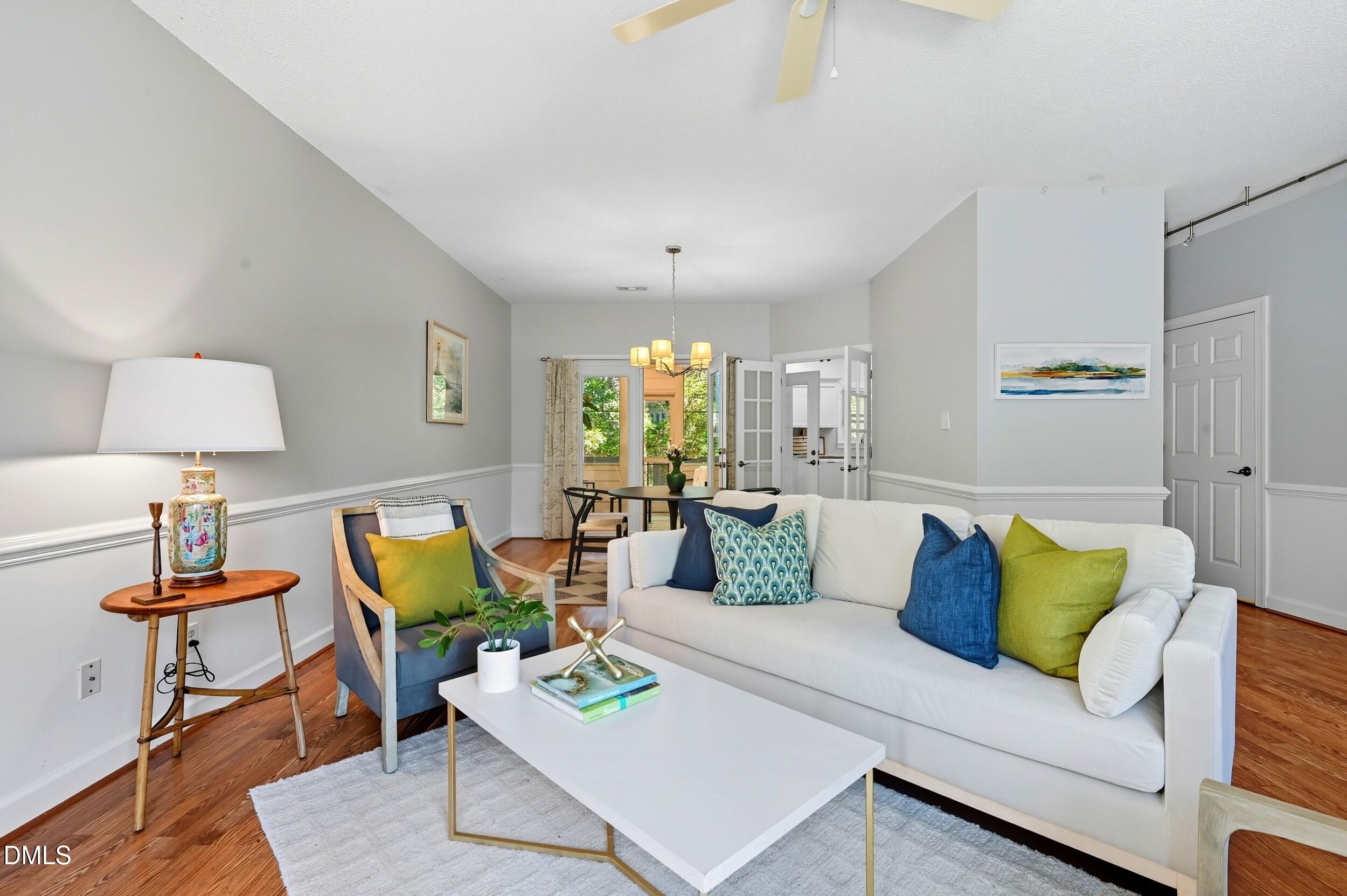 4111 Settlement Drive Durham, NC 27713 - Photo 4 of 25 a living room with furniture and a lamp