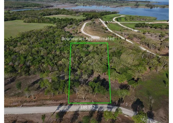 a view of a houses with a park