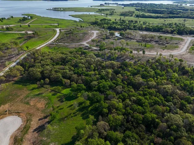 a view of a houses with a park