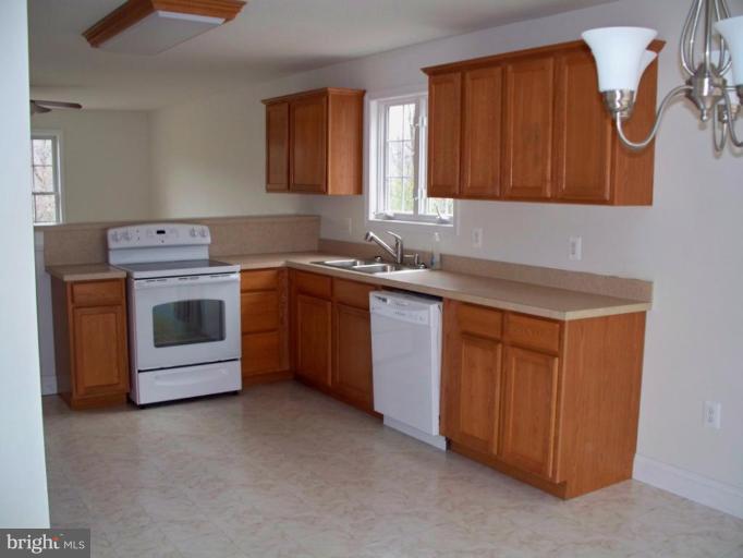 2 McCoy Road Berkeley Springs, WV 25411 - Photo 5 of 24 Beautiful oak cabinets
