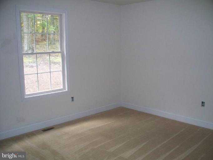 2 McCoy Road Berkeley Springs, WV 25411 - Photo 8 of 24 Master Bedroom