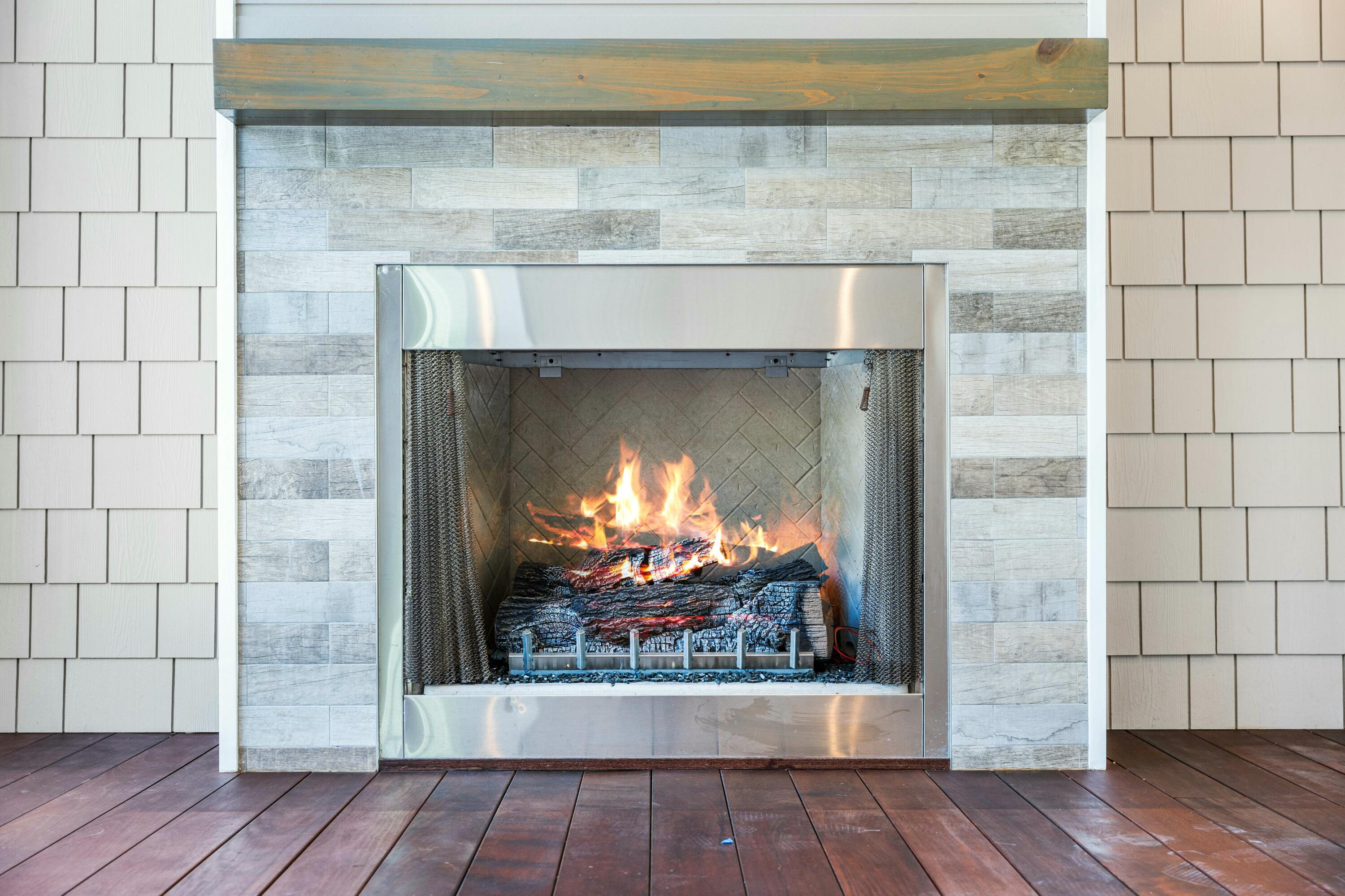 21 Seastone Ct Inlet Beach Inlet Beach, FL 32461 - Photo 81 of 93 Second gas fireplace in screened porch