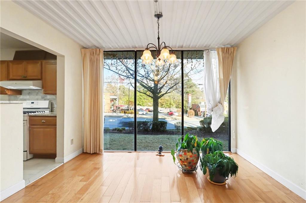 4300 Roswell Road Northeast, Unit 4303 Atlanta, GA 30342 - Photo 18 of 39 a room with window and furniture