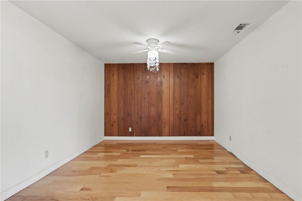 4300 Roswell Road Northeast, Unit 4303 Atlanta, GA 30342 - Photo 24 of 39 a view of a chandelier fan and entryway