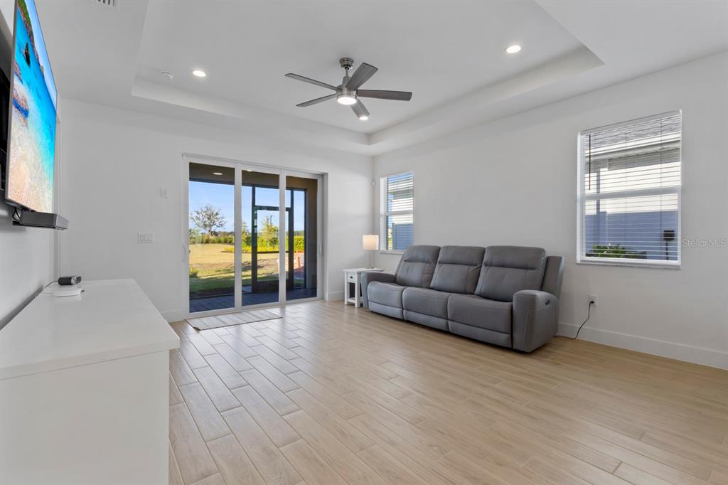 44319 Panther Drive Punta Gorda, FL 33982 - Photo 13 of 49 a living room with furniture and a flat screen tv