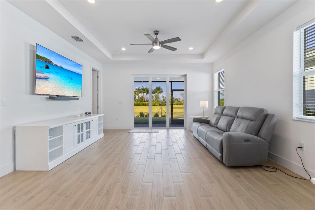 44319 Panther Drive Punta Gorda, FL 33982 - Photo 14 of 49 a living room with furniture and a flat screen tv