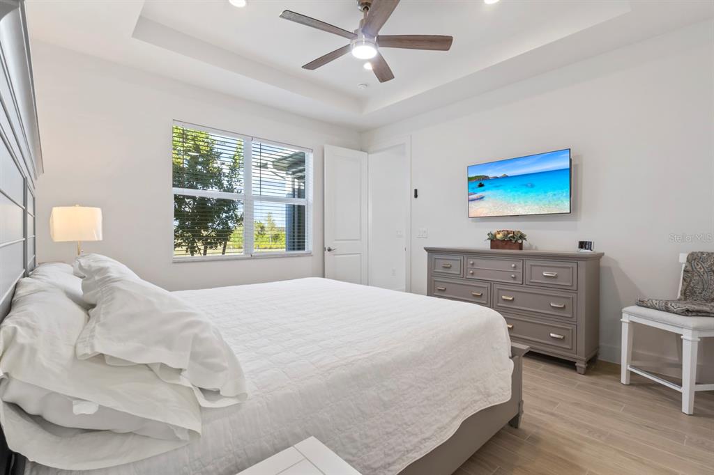 44319 Panther Drive Punta Gorda, FL 33982 - Photo 20 of 49 a bedroom with a bed and a window