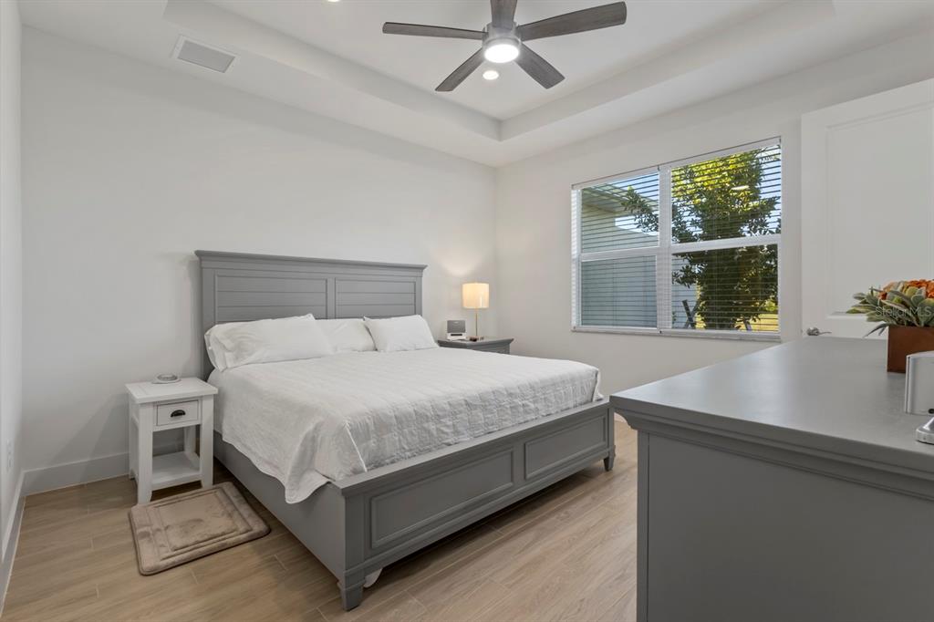 44319 Panther Drive Punta Gorda, FL 33982 - Photo 21 of 49 a bedroom with a bed and window