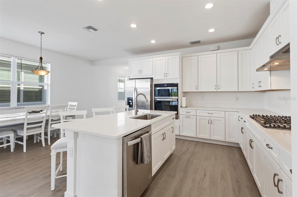 44319 Panther Drive Punta Gorda, FL 33982 - Photo 5 of 49 a kitchen with appliances a sink and cabinets
