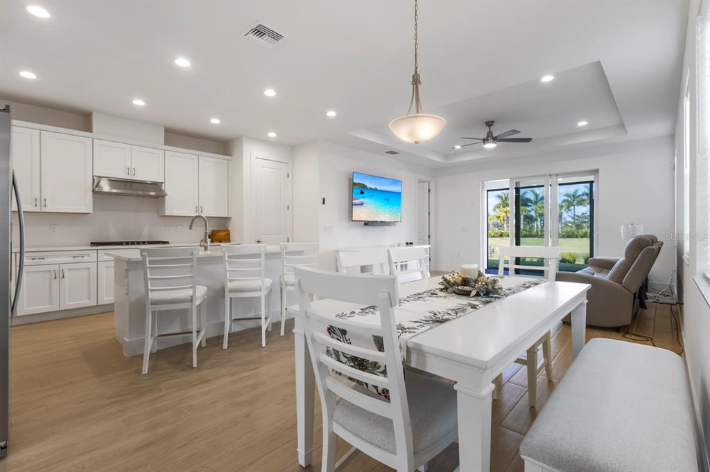 44319 Panther Drive Punta Gorda, FL 33982 - Photo 7 of 49 a kitchen that has a table and chairs in it