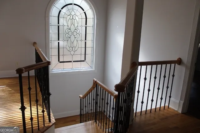 a view of staircase with large window