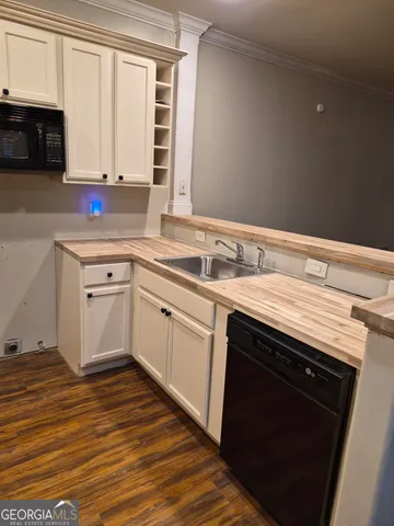 a view of front door with a mirror