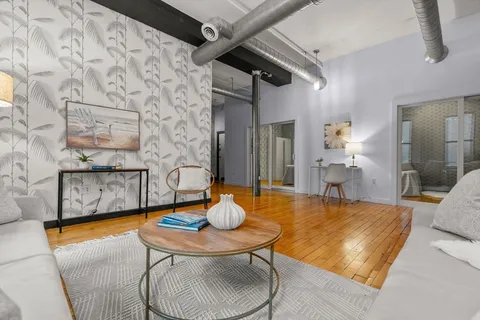 a living room with fireplace