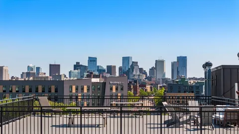 a view of a city with tall buildings