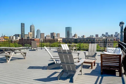 a view of a terrace with furniture