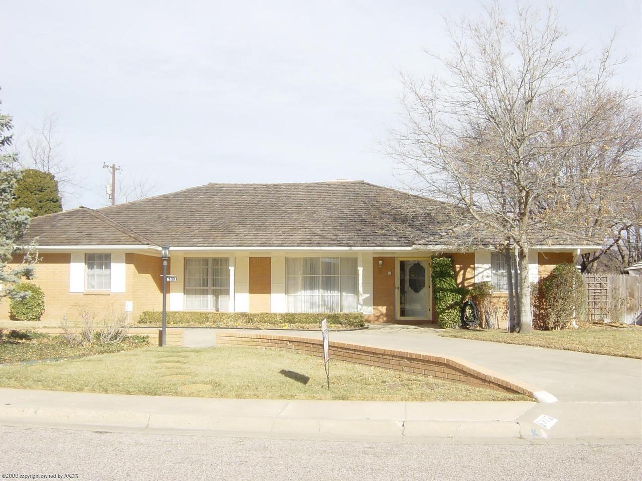 6312 Jameson Road Amarillo, TX 79106 - Photo 1 of 15 a view of a house with snow on the background