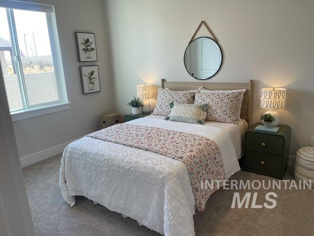 2035 Sumac Avenue Middleton, ID 83644 - Photo 11 of 17 Bedroom featuring a double-pane window, neutral wall paint, and gray carpet flooring