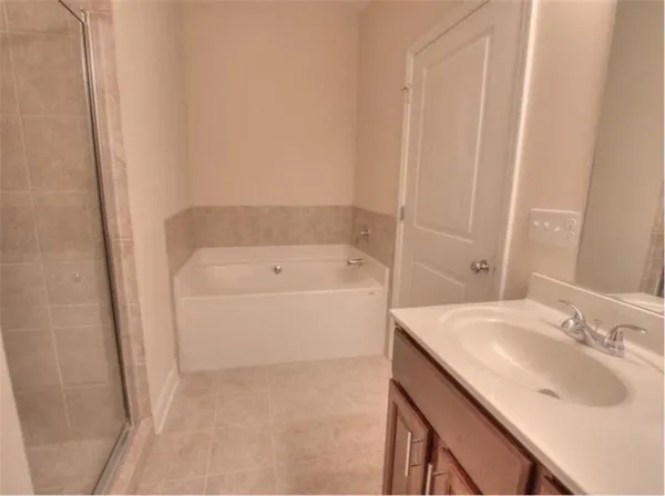 a bathroom with a sink and a bathtub
