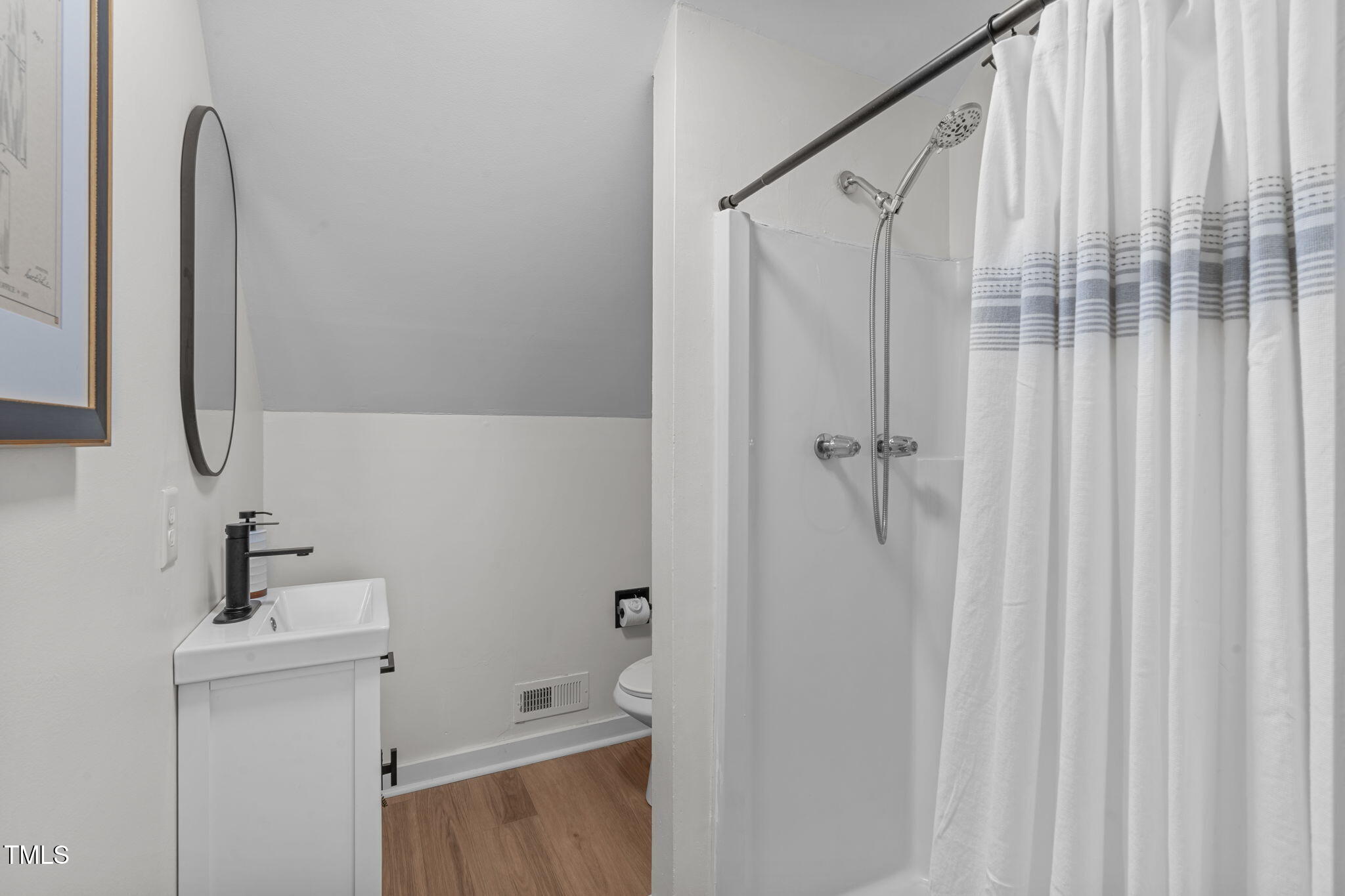 211 Fleming Drive Durham, NC 27712 - Photo 26 of 34 a bathroom with a shower and a sink