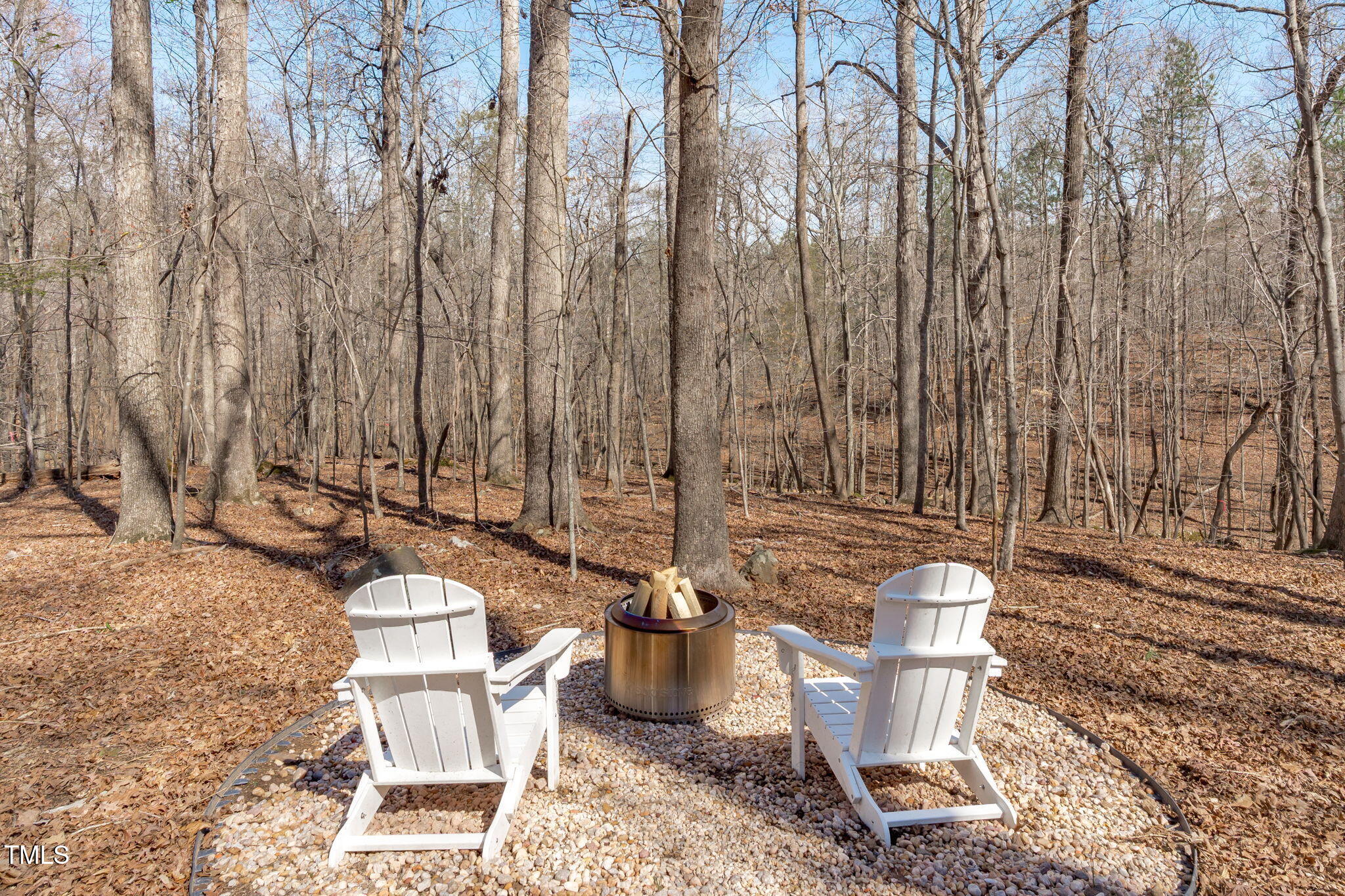 211 Fleming Drive Durham, NC 27712 - Photo 30 of 34 a view of a chairs and table in backyard