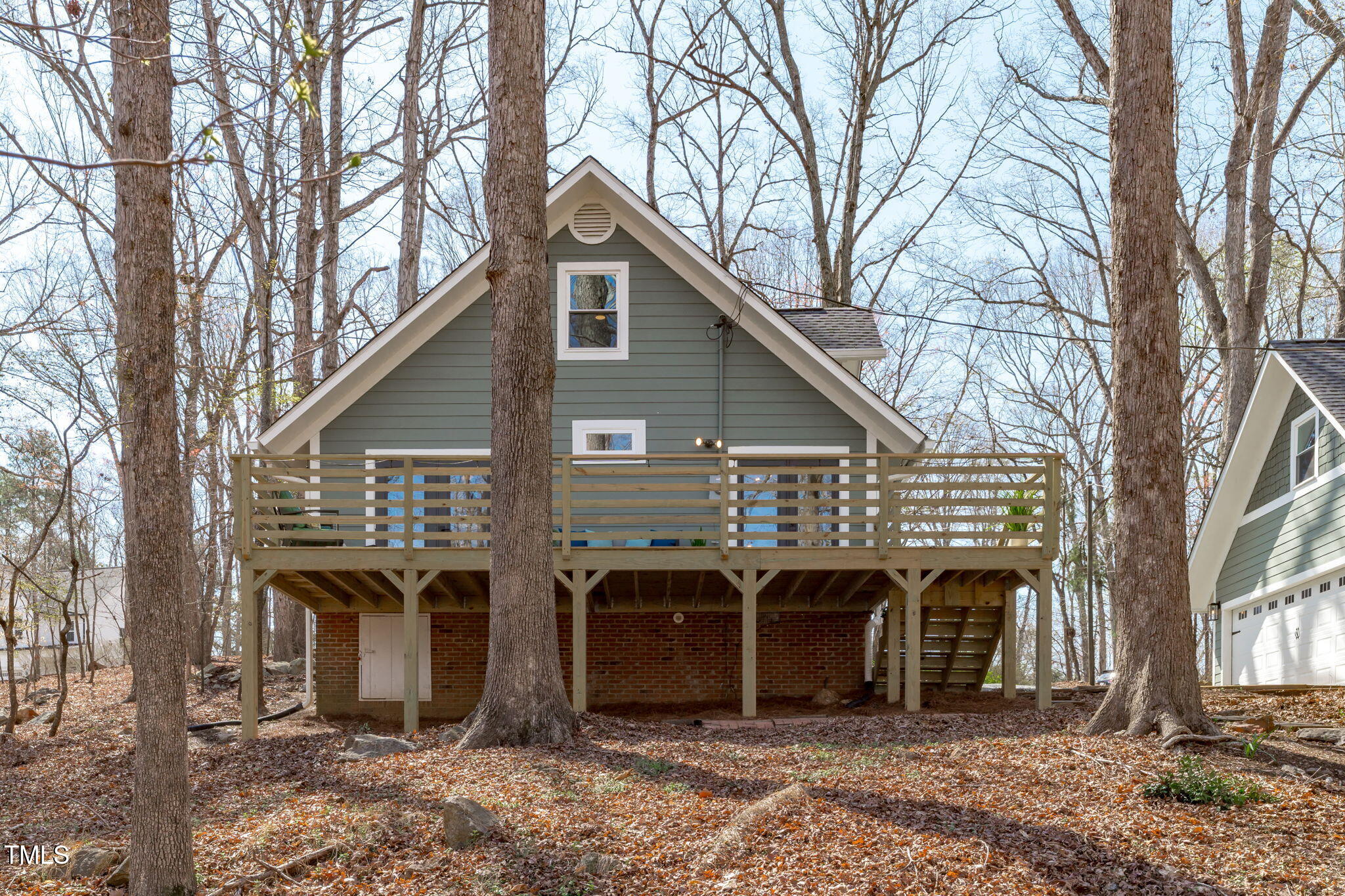 211 Fleming Drive Durham, NC 27712 - Photo 32 of 34 a view of a house with a yard and large trees