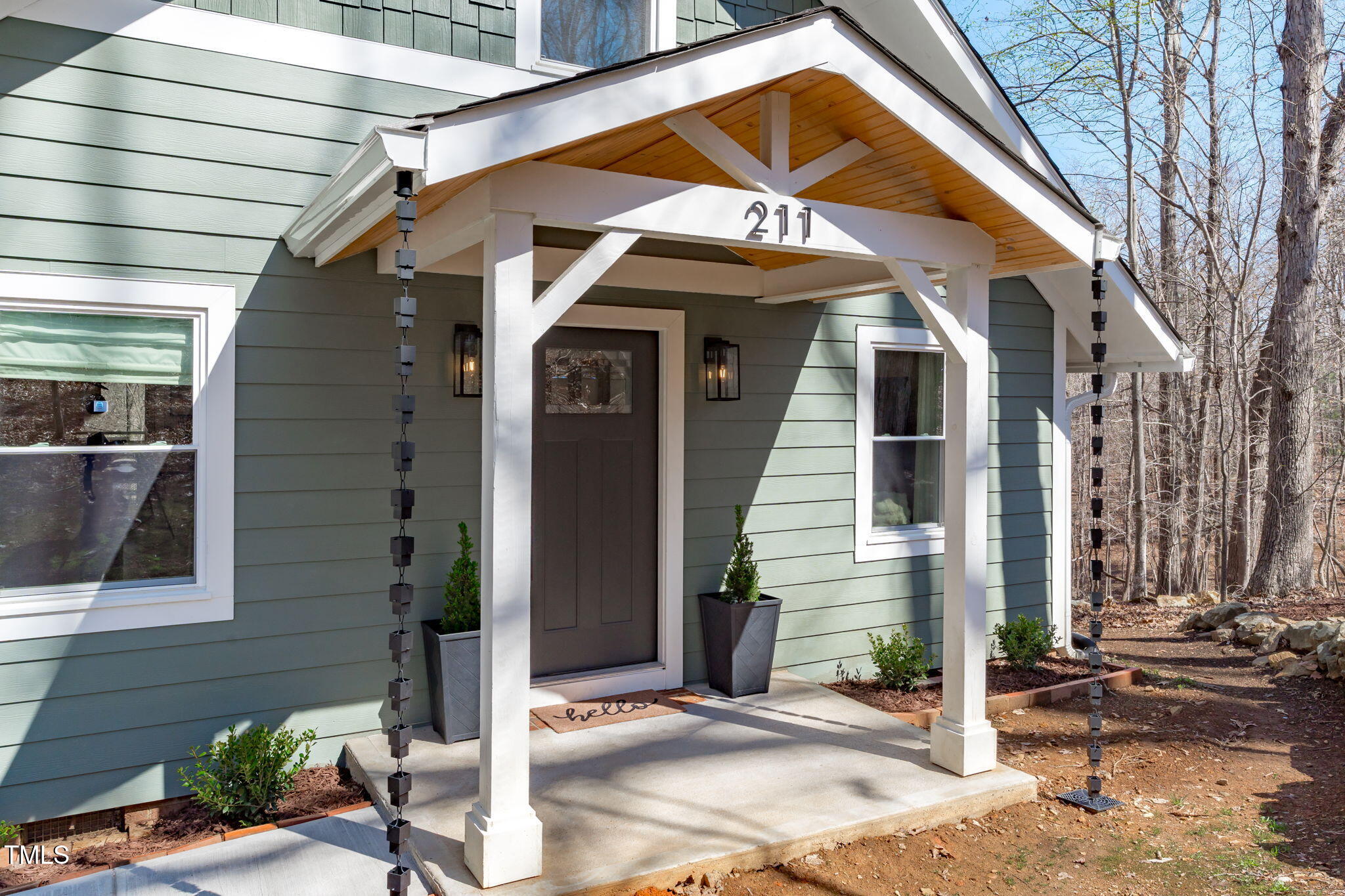 211 Fleming Drive Durham, NC 27712 - Photo 5 of 34 a view of a brick house with many windows