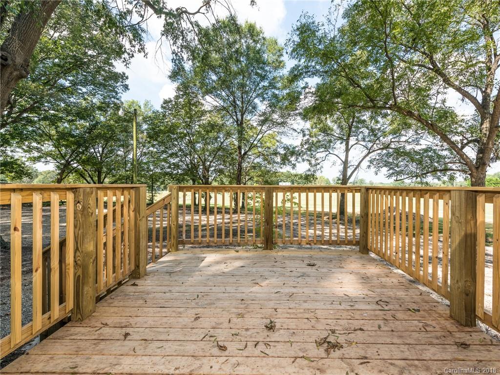 2022 Long Hope Road Monroe, NC 28112 - Photo 24 of 28 a view of entrance gate with wooden fence