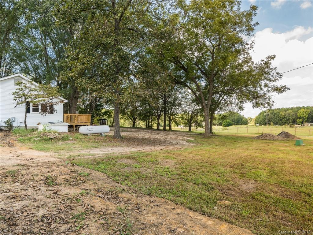 2022 Long Hope Road Monroe, NC 28112 - Photo 25 of 28 a view of yard with swimming pool and green space