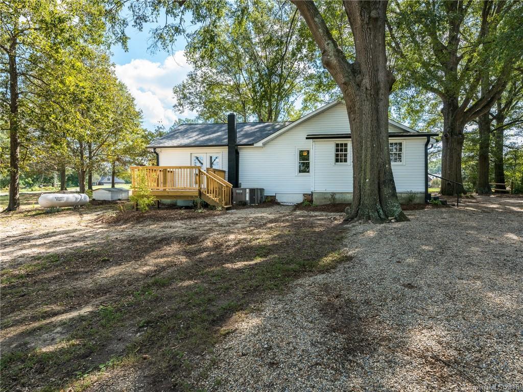 2022 Long Hope Road Monroe, NC 28112 - Photo 26 of 28 a view of a house with a yard