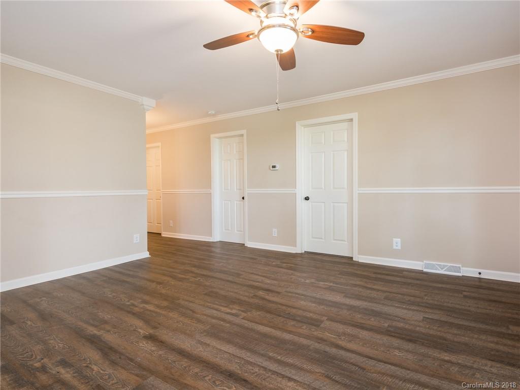 2022 Long Hope Road Monroe, NC 28112 - Photo 10 of 28 wooden floor in an empty room