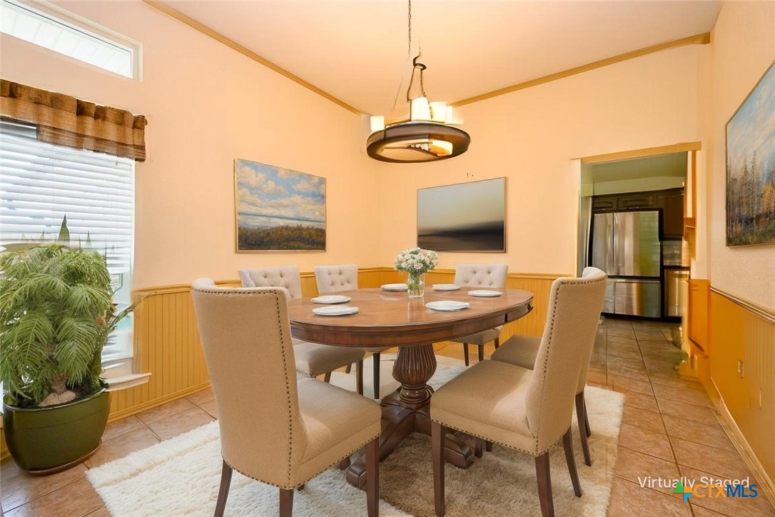 138 County Road 4963 Kempner, TX 76539 - Photo 17 of 46 a view of a dining room with furniture window and wooden floor