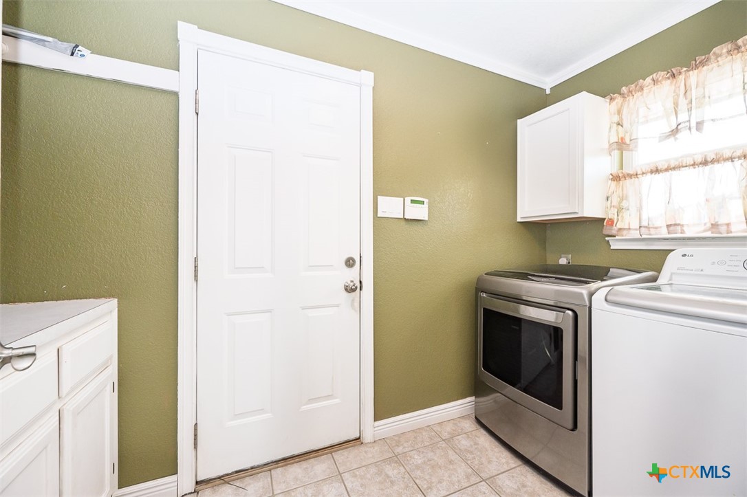 138 County Road 4963 Kempner, TX 76539 - Photo 30 of 46 a utility room with dryer and washer