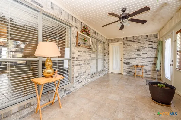 en empty room with windows