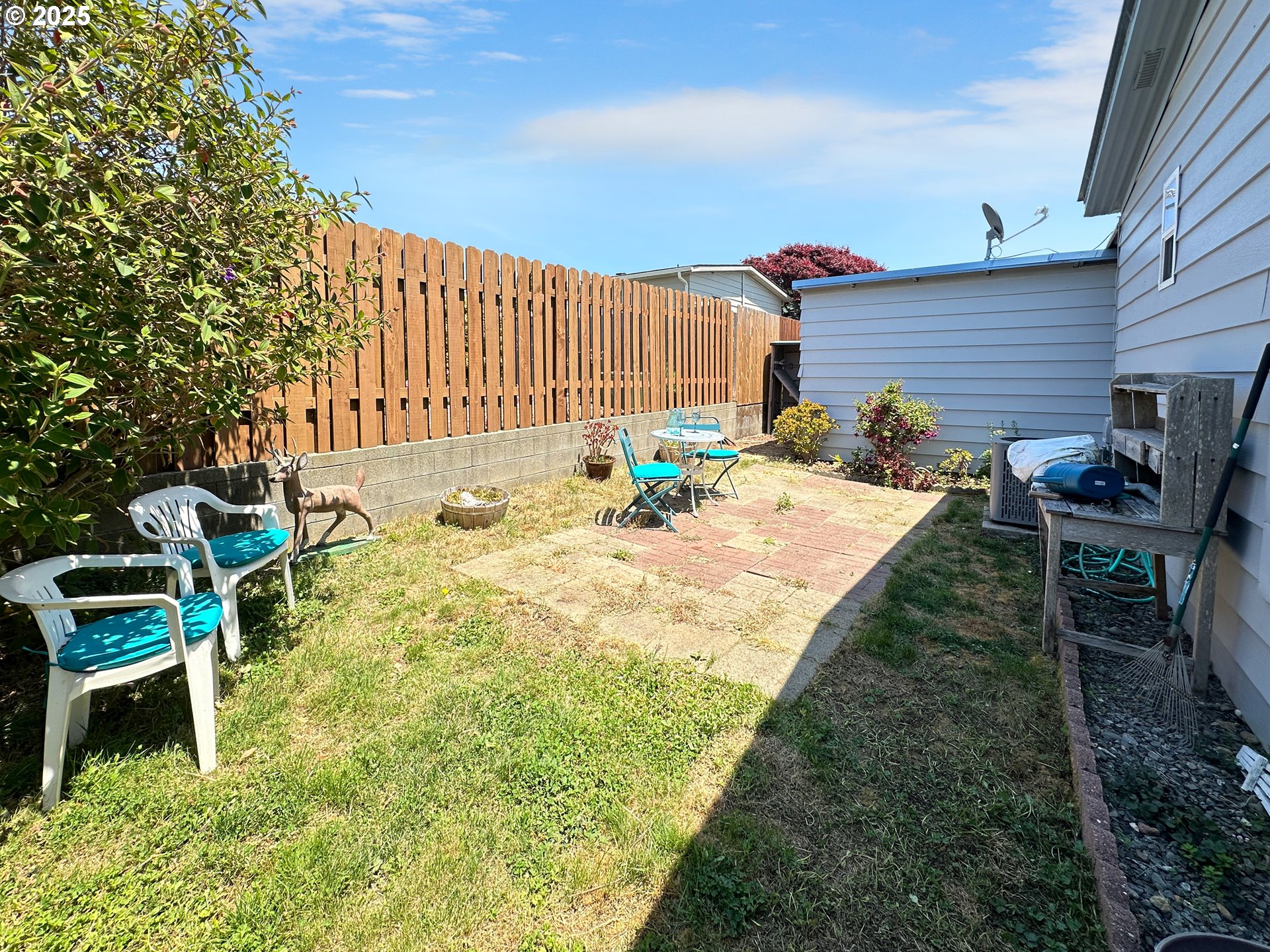 15889 Sunset Strip, Unit 35 Brookings, OR 97415 - Photo 20 of 21 a view of an chairs and tables in the patio