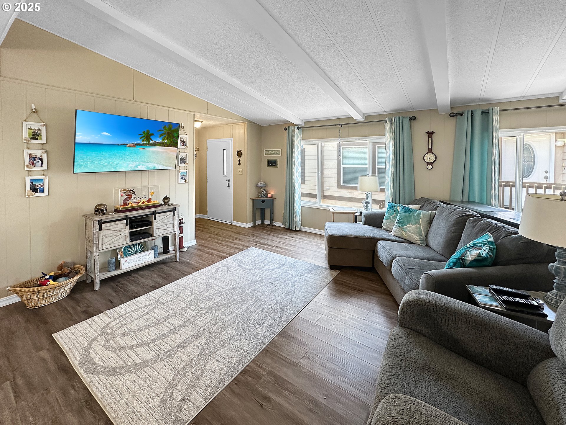 15889 Sunset Strip, Unit 35 Brookings, OR 97415 - Photo 4 of 21 a living room with furniture and a wooden floor