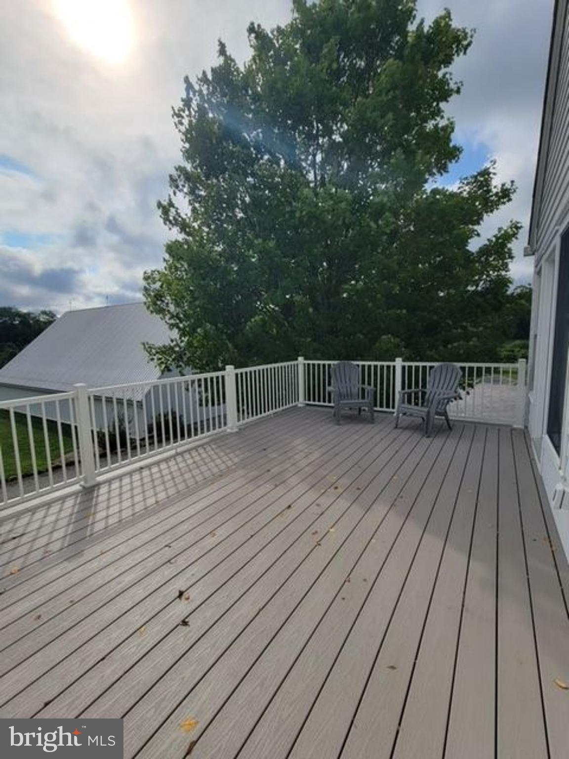 33 Rittenhouse Road, Unit E Stockton, NJ 08559 - Photo 11 of 15 a view of a wooden deck