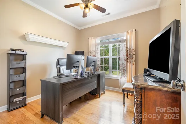 a room with furniture and a flat screen tv