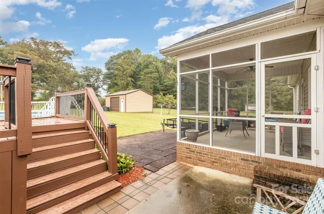 a view of a house with a large window